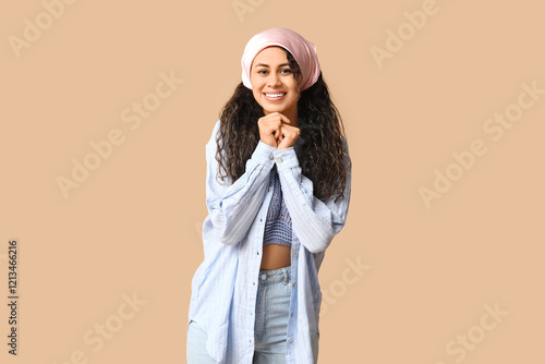 Smiling young woman with cu...