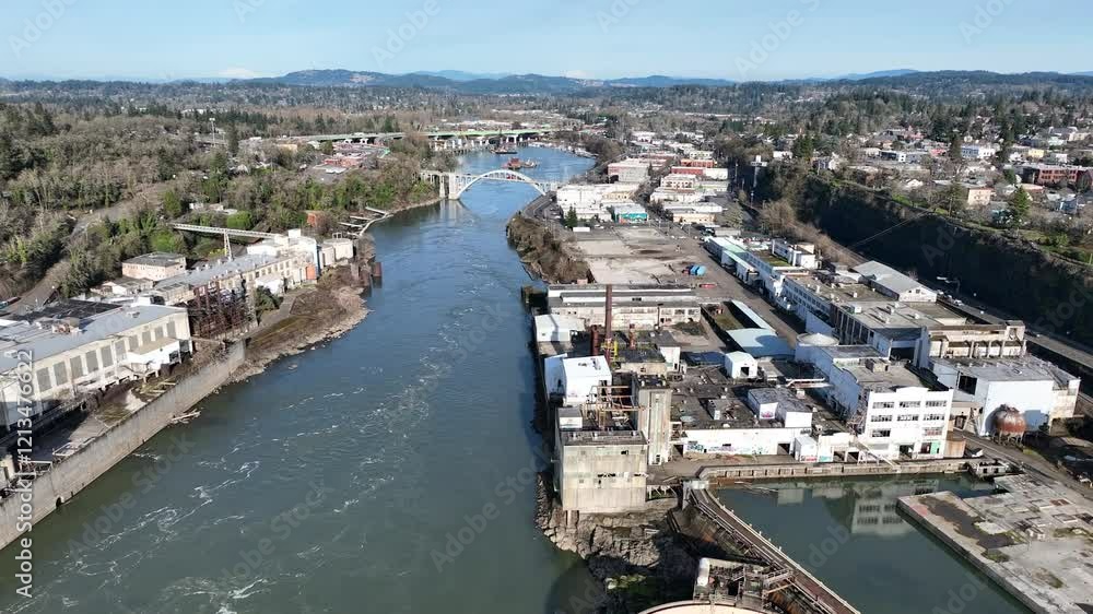 Completed in 1922, the Oregon City Bridge, also called the Arch Bridge, spans the Willamette River connecting West Linn and Oregon City, Oregon.