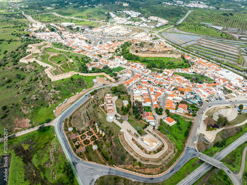 Aerial view of Castro Marim, Portuguese fortress town on the border above the Guadiana river with bastions, horn work, gun ports salt flats photo