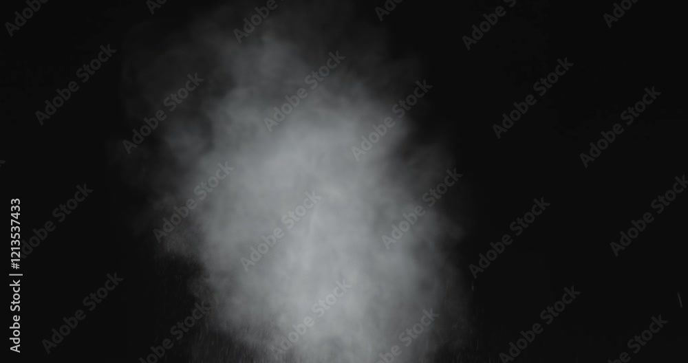 4K VFX practical element slow-motion close-up of dust explosion from bullet hitting the black wall. A dense powder explosion occurs against a black background action element. Gunshot impact on black