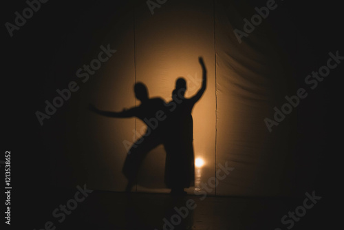 silhouette of a person with a guitar