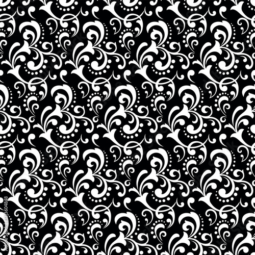 Wallpaper in the style of Baroque. Seamless vector background. White and black floral ornament. Graphic pattern for fabric, wallpaper, packaging. Ornate Damask flower ornament.