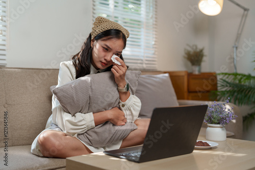 Photography Sad woman wiping tears while watching a heartbreaking movie or receiving distres