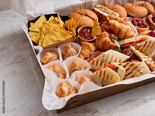 Εκτύπωση καμβά A colorful catering tray filled with an assortment of sandwiches, croissants, ch