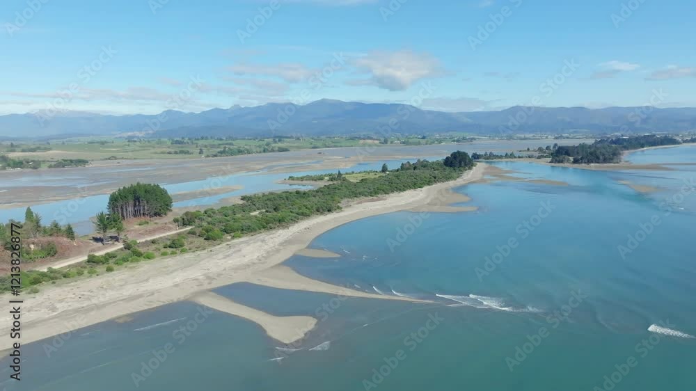 Drone shot flying up the Tasman bay coastline towards Motueka, New Zealand Drone shot flying up the Tasman bay coastline towards Motueka, New Zealand