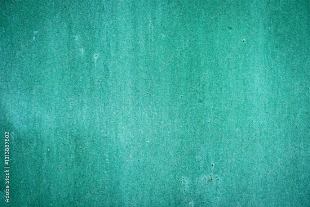 A simple yet striking photograph of a green textured wall, showcasing subtle gradients and imperfections in the surface. The texture adds depth and character to the otherwise minimalistic composition. A simple yet striking photograph of a green textured wall, showcasing subtle gradients and imperfections in the surface. The texture adds depth and character to the otherwise minimalistic composition.