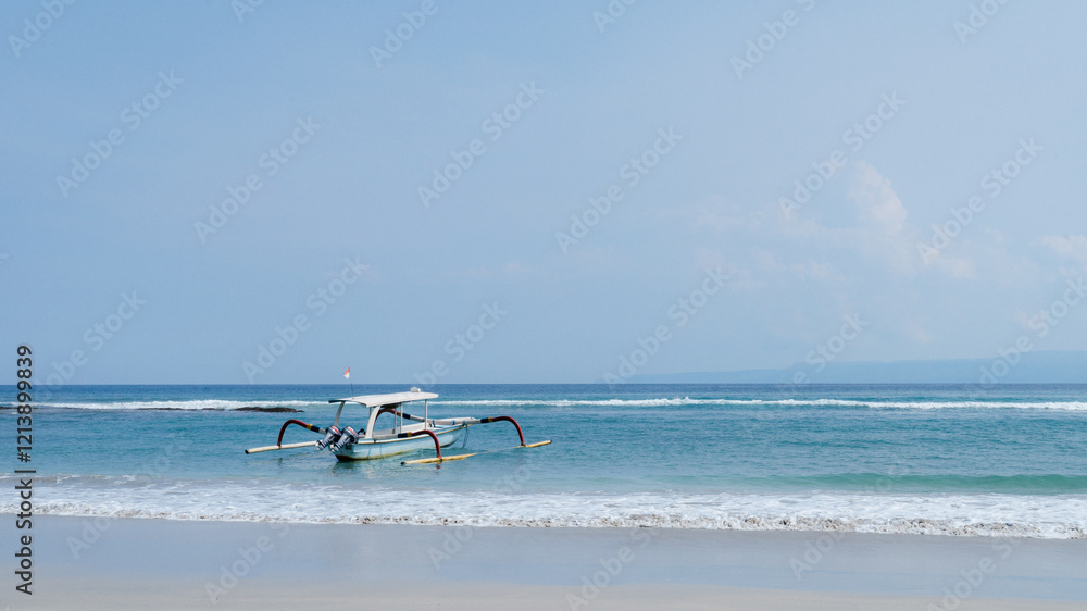 Naklejka premium Seascape with boats on beach. Floating boat on clear sea water and blue sky in summer. Vacation and holidays.