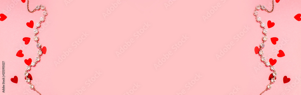 A diamond bracelet lies on a pink background
A diamond bracelet lies on a pink background