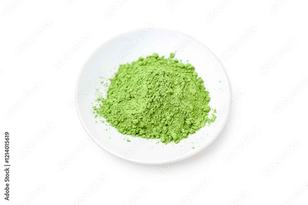 Top view of Green tea powder on white plaete isolated on white background. Top view of Green tea powder on white plaete isolated on white background.