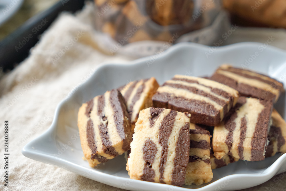 A plate of Striped Butter Cookies atau Biskut Belang. A plate of Striped Butter Cookies atau Biskut Belang.