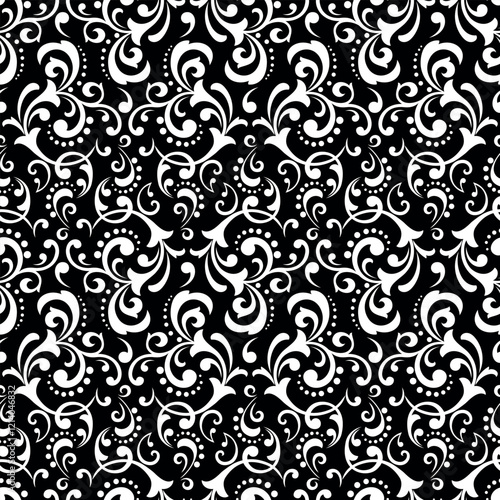 Wallpaper in the style of Baroque. Seamless vector background. White and black floral ornament. Graphic pattern for fabric, wallpaper, packaging. Ornate Damask flower ornament.