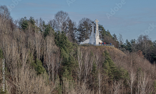 The Three Crosses Monument on the forested Hill in Kalny Park, as seen from Gediminas Hill in the Old Town of Vilnius, Vilnius, Lithuania