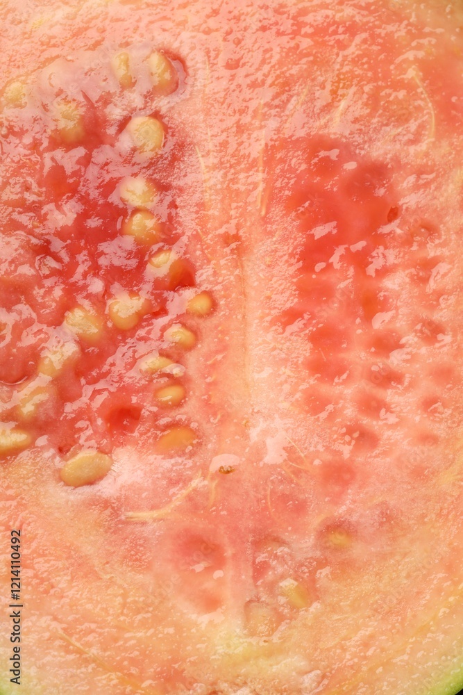 Fototapeta premium Juicy guava fruit with seeds as background, top view