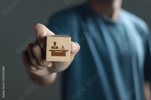 Business legislation, legal advice online and lawyer, Law, justice, and legal services. Person hold wooden block with law icon. photo