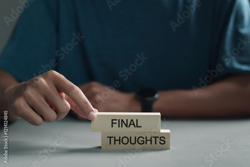 Conclusion summary concept, Person with Final Thoughts on wooden block.