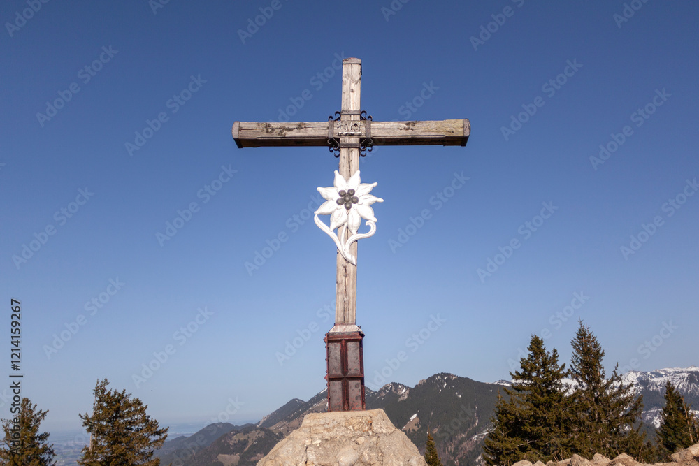 Summit cross at Heuberg mountain tour in springtime Summit cross at Heuberg mountain tour in springtime