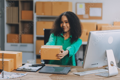 Portrait of Starting small businesses SME owners female entrepreneurs working on receipt box and check online orders to prepare to pack the boxes, sell to customers, SME business ideas online. photo