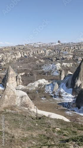 View of cappadocia, Uchisar , famous place of turkey, natural formation fairy chimneys. Eroded rock formations in Cappadocia. Vertical video