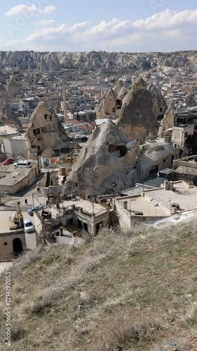 Eroded rock formations in Cappadocia. Vertical video.