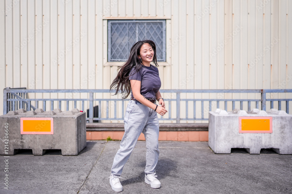 Woman dancing k-pop alone in the city Woman dancing k-pop alone in the city