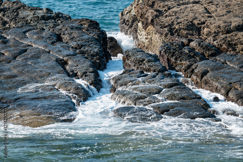 Beautiful texture cut by the sea on the reef of coastline, in Keelung City, Taiwan. photo