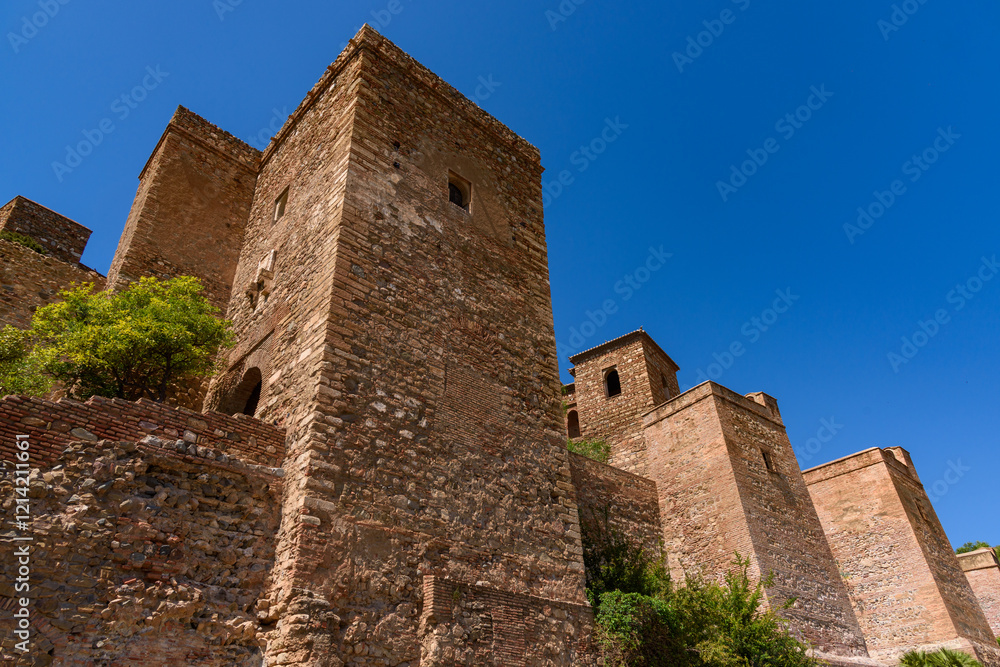 Malaga, Spain - August 06, 2024: Walls and bastion of the castle fort Gibralfaro in Malaga. Castillo de Gibralfaro.