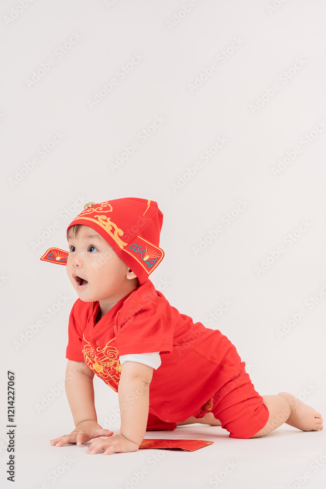 Happy chinese new year kid boy.Asian toddler boy wearing chinese traditional cheongsam qipao shirt showing red envelope at home.Happy chinese new year concept.Holidays in asian people. Happy chinese new year kid boy.Asian toddler boy wearing chinese traditional cheongsam qipao shirt showing red envelope at home.Happy chinese new year concept.Holidays in asian people.