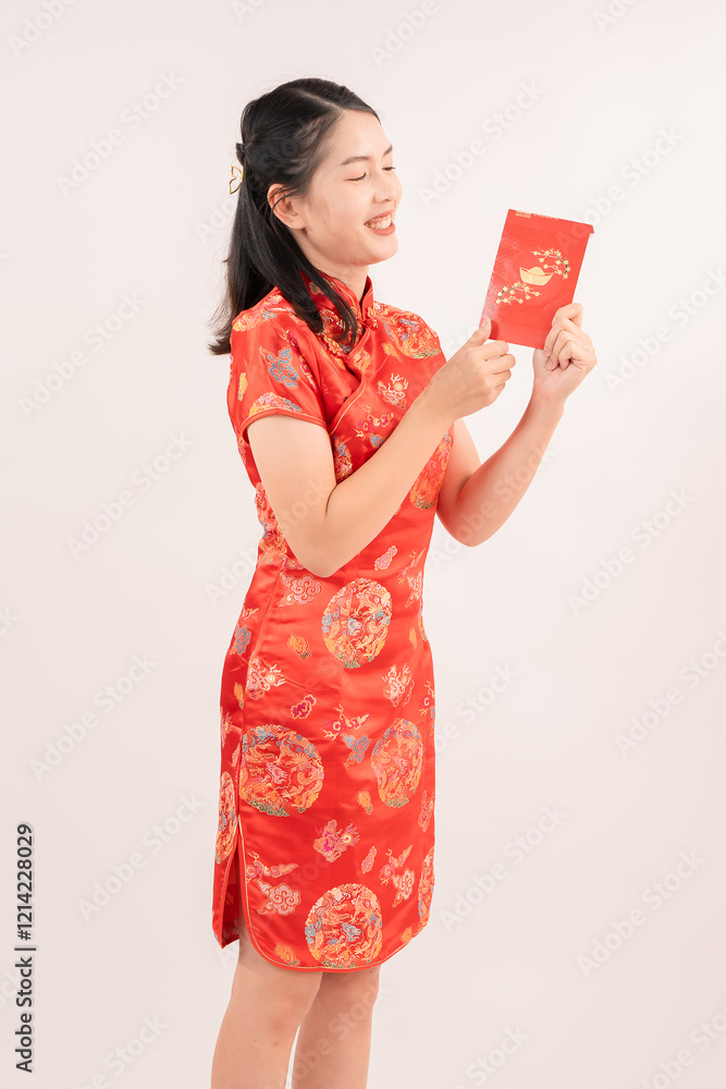 Chinese New Year theme, A young mother wearing Chinese traditional dress. Chinese New Year theme, A young mother wearing Chinese traditional dress.