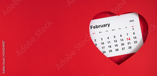 Foto Top view of a red heart frame with a calendar sheet for February 14, 2025, marked in red, placed inside