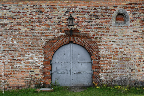 Beautiful historical town antique architecture stone wall iron gate