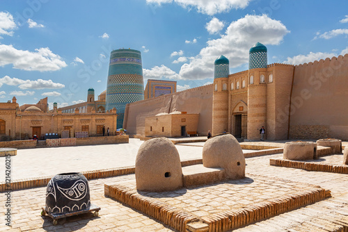Ark palace entrance and Kalta Minor minaret in Khiva (Xiva), Uzbekistan