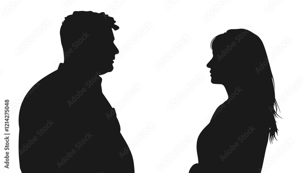 Silhouetted man and woman standing face to face Silhouetted man and woman standing face to face
