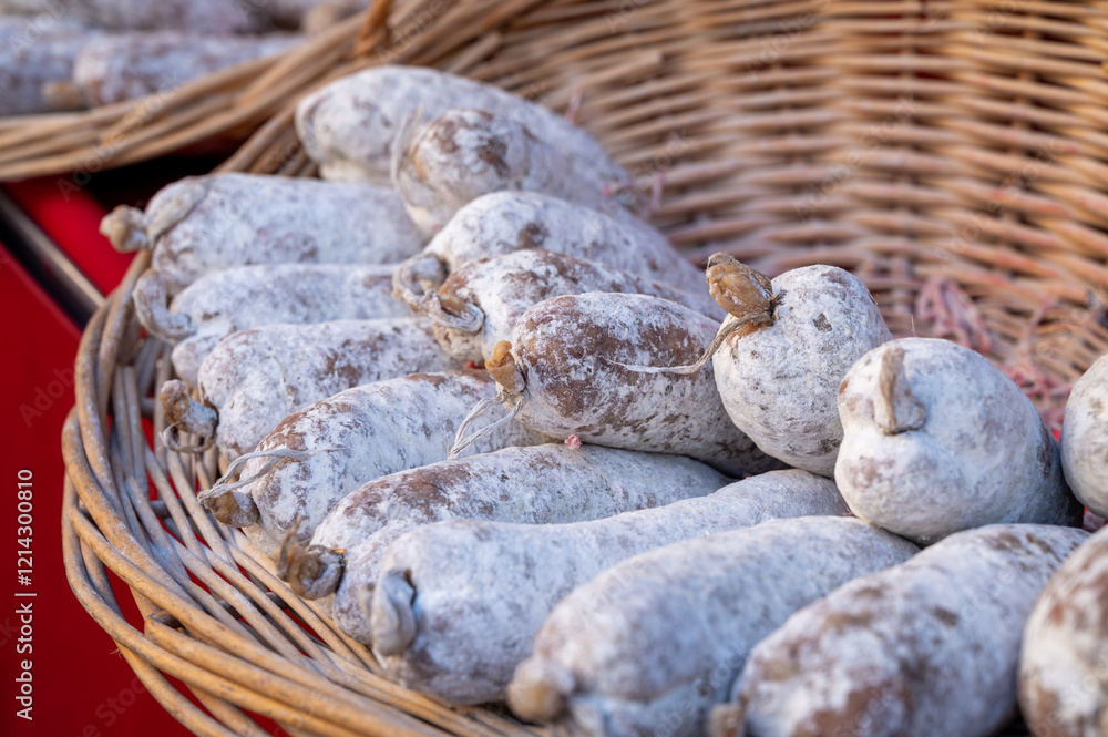 Variety of homemade dried salami sausages in French butchery shop, Dordogne, France, meat food background close up Variety of homemade dried salami sausages in French butchery shop, Dordogne, France, meat food background close up