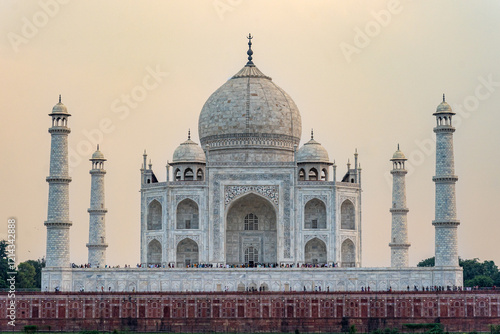 India. Uttar Pradesh state. Agra. Taj Mahal. White marble mausoleum built by the Muslim Mughal emperor Shah Jahan in memory of his wife Mumtaz Mahal. The Taj Mahal at sunset photo