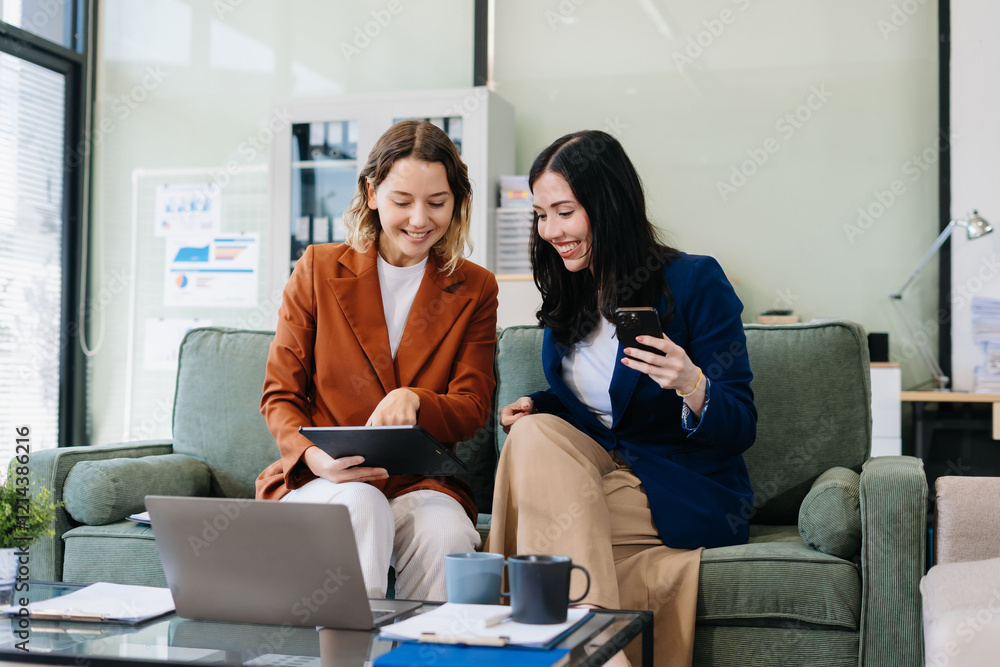 Obraz premium Diverse Business Team Discusses Financial Project Analysis in Meeting.