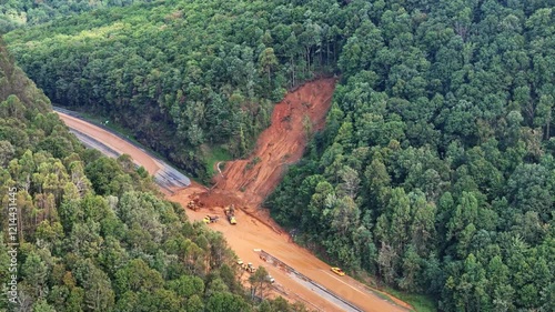 Heavy Equipment works to clear Interstate 40 after Hurricane Helene mudslide. photo