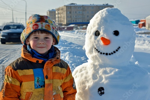 Winter fun with snow: cute two different ages brothers makes a s photo