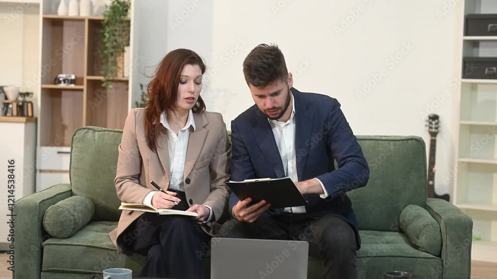 Teamwork and innovation as two businesswomen collaborate using a tablet in a stylish office setting Teamwork and innovation as two businesswomen collaborate using a tablet in a stylish office setting