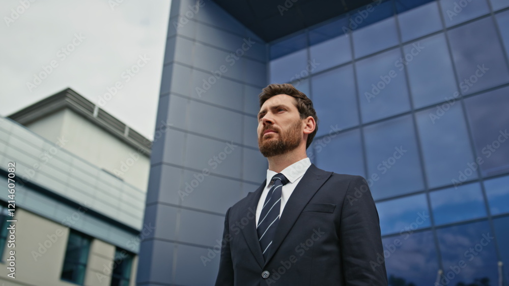 Successful ceo posing outside glass office building closeup. Bearded executive Successful ceo posing outside glass office building closeup. Bearded executive