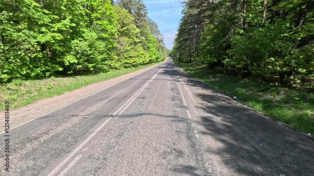 Highways, roadside and road line markings. The car drives along the road. Highways, roadside and road line markings. The car drives along the road.