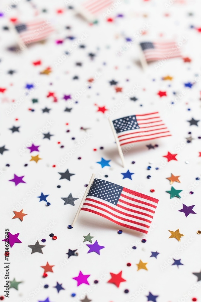 Small American flags arranged on a table Small American flags arranged on a table