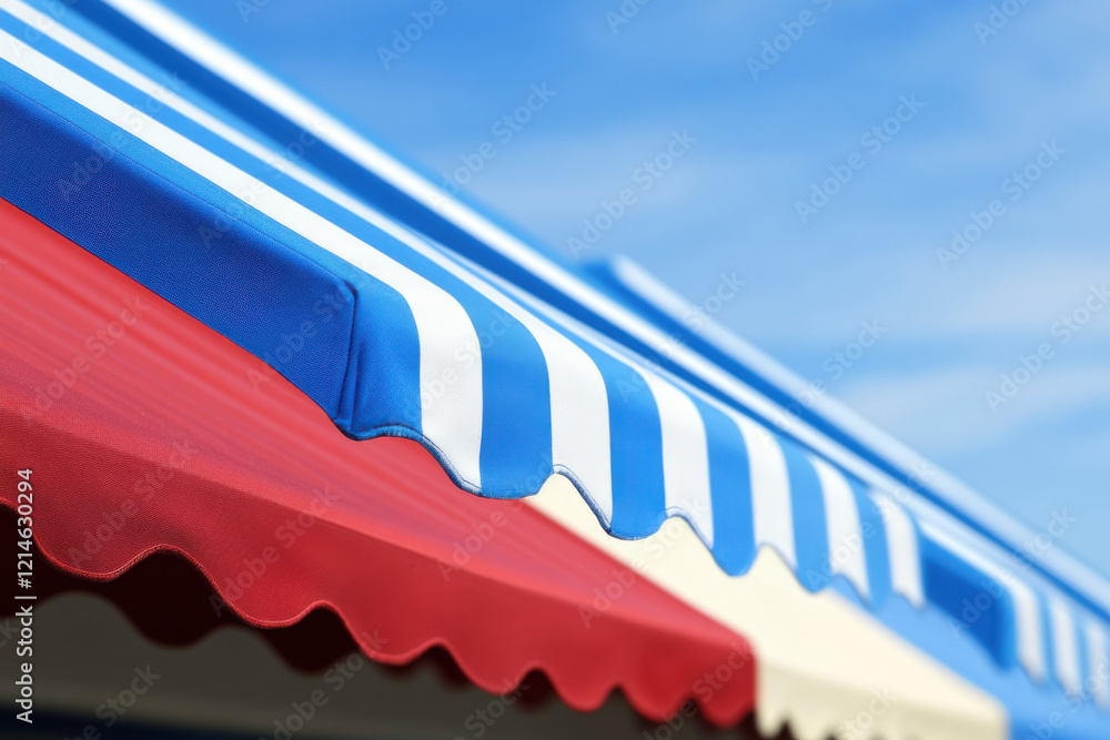 Fototapeta premium A blue and red striped awning with white stripes