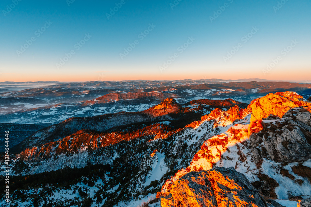 Naklejka premium Winter hiking to Velky Rozsutec in Mala Fatra National park is full of beautiful views. Sunset in Slovakia mountains. Slovakia landscape