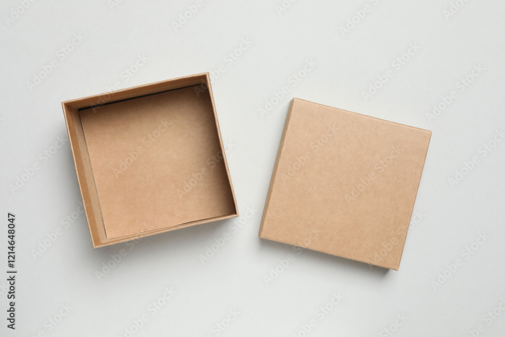 Fototapeta premium Open box on gray background