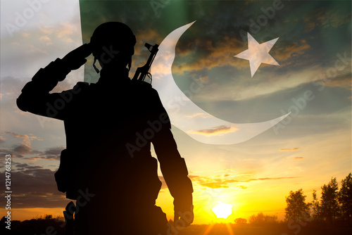 Silhouette of soldier against the sunset with Pakistan flag. National Holidays concept photo