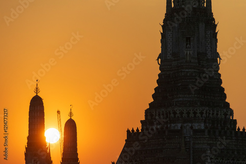 Wat Arun Ratchawararam Ratchawaramahawihan or Wat Arun (Temple of Dawn) is a Buddhist temple along the Chao Phraya river at twilight in Bangkok, Thailand. photo