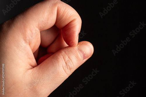 Photos Stressed woman picking nails