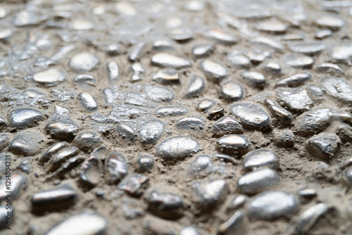 Εκτύπωση καμβά Close-up of a cobblestone or pebblestone concrete road surface