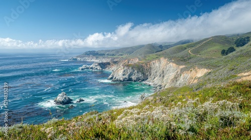 A grandview of the ocean stretching to the horizon, with cliffs and lush greenery in the foreground. photo