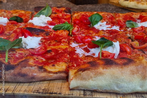 Delicious Gourmet Margherita Pizza with Fresh Tomatoes and Basil for Culinary Delights photo